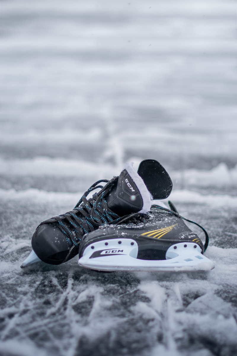 a pair of ice skates laying on the ice